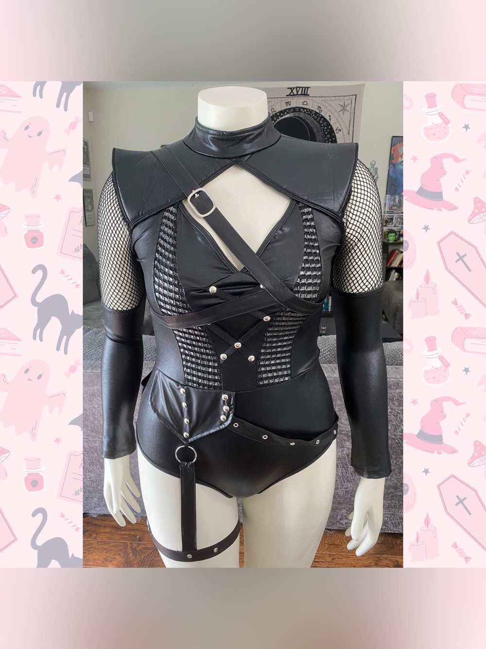 Leg Avenue Black Faux Leather Gothic Harness Bodysuit with Fishnet Sleeves